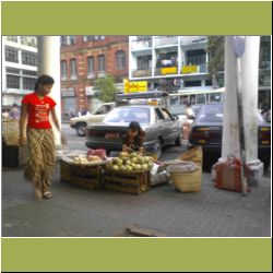 yangon-fruit-seller-reading.jpg