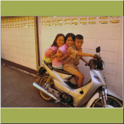 3-kids-on-motorbike-church.jpg